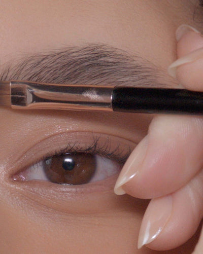 Applying Brow Powder Duo in Granite