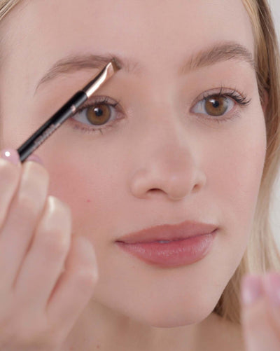 Applying Brow Powder Duo in Taupe